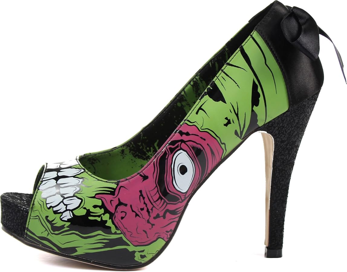 An green and black stiletto sporting monster eyes and teeth